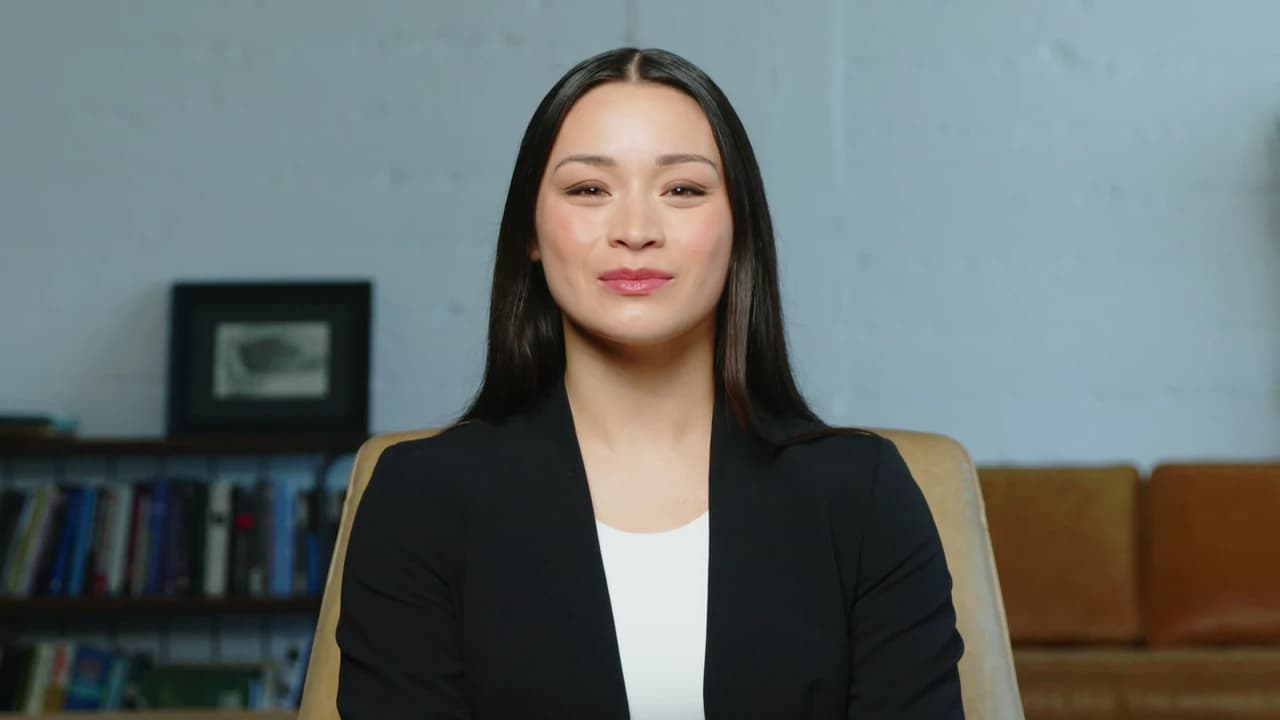 Language Evaluator, played by the Alessandra AI avatar